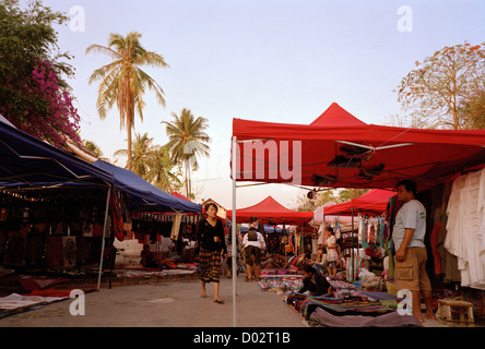 The tourist night market in Luang Prabang in Laos in Indochina in Far East Southeast Asia. Travel Stock Photo