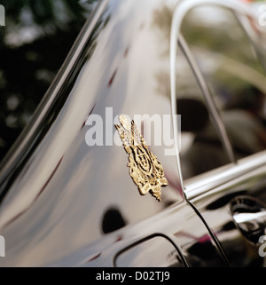 Cambodian royal crest on the car of the King in Phnom Penh Cambodia in Far East Southeast Asia. Monarch Cars Motif Logo Royalty Insignia Art Travel Stock Photo