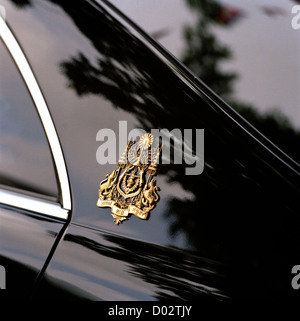 Cambodian royal crest on the car of the King in Phnom Penh Cambodia in Far East Southeast Asia. Monarch Cars Motif Logo Royalty Insignia Art Travel Stock Photo