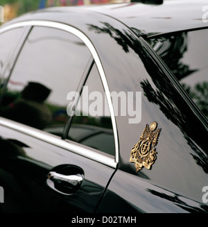 Cambodian royal crest on the car of the King in Phnom Penh Cambodia in Far East Southeast Asia. Monarch Cars Motif Logo Royalty Insignia Art Travel Stock Photo