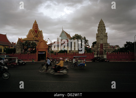 Street life in Phnom Penh Cambodia in Far East Southeast Asia. Lifestyle Urban City Khmer Architecture Building Weather Stormy Sky Wanderlust Travel Stock Photo