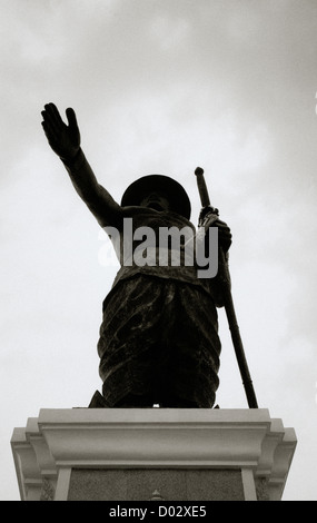 Travel Photography - Statue of King Fa Ngum in Vientiane in Laos in Indochina in Southeast Asia Far East. Silhouette Sky History Stock Photo
