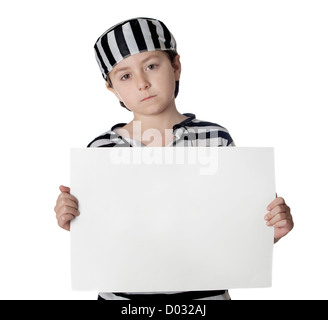 Sad child with prisoner costume and blank poster isolated on white background Stock Photo