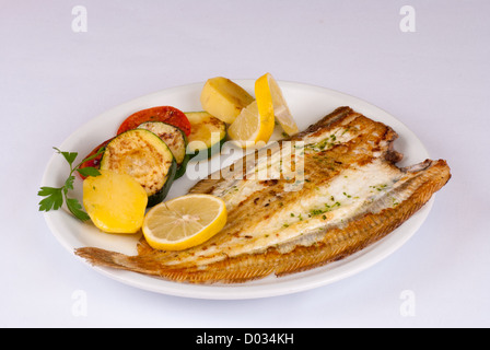 Grilled sole served with vegetables, a very Mediterranean recipe Stock Photo