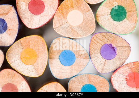 Many pencils of different colors on a over white background-Shallow DOF- Stock Photo