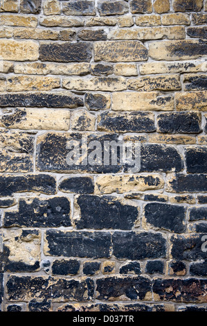 Brick wall from an old church build around the year 1200 in the Netherlands Stock Photo