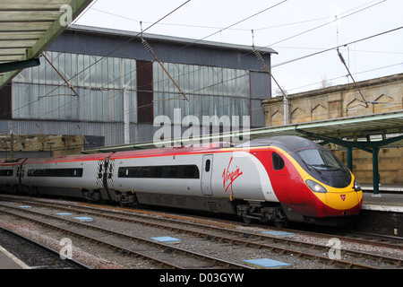 Class 390 Virgin Pendolino electric multiple unit train at Carlisle station on a service to Glasgow Central. Stock Photo