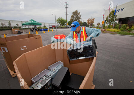 Electronic and computer equipment is sorted and recycled at Sony offices in Carson, California, as part of America Recycles Day on November 15, 2012. Established in 1997, America Recycles Day is dedicated to promoting recycling through awareness and resourcefulness in the United States. Stock Photo