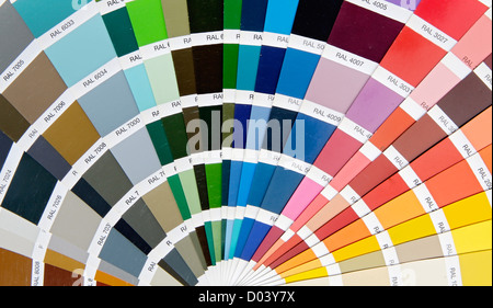 Photo of a fan of colors in the table Stock Photo