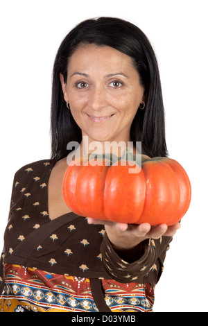 Attractive girl with a big pumpkin isolated on white background Stock Photo