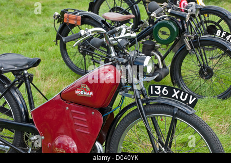 Close up of vintage old Norman and Royal Enfield motorcycles motorbike motorcycle motorbikes on display England UK United Kingdom GB Great Britain Stock Photo