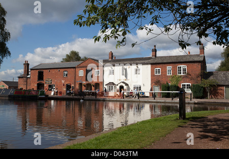 The Swan pub at Fradley Junction taken from the Coventry canal looking towards the Trent and Mersey Canal Staffordshire England Stock Photo