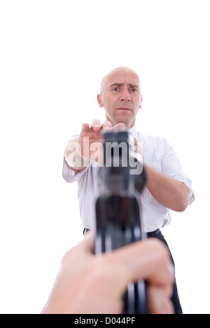 directed gun in man on white background Stock Photo