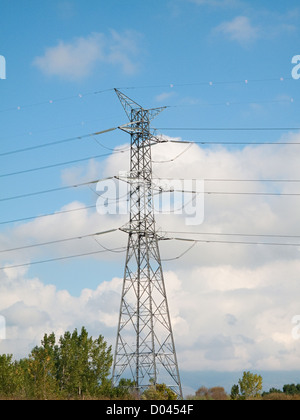 Power lines under a pretty blue sky Stock Photo - Alamy