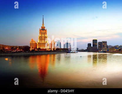 Night Moscow. Moscow River. A kind from Krasnopresnenskaya quay on hotel Ukraine. Stock Photo