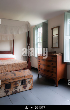 Four poster bed and chest of drawers in bedroom at the Nathanel Greene Homestead. Declared a National Historic Landmark in 1972
