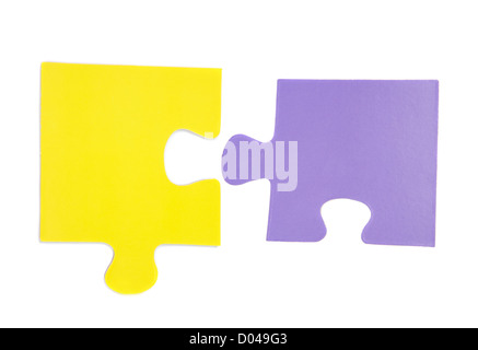 Two pieces of puzzle isolated over white Stock Photo