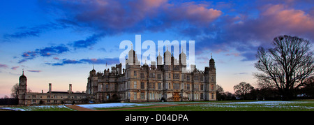 Late winter sunset over the west elevation of the Elizabethan Stately Home of Burghley House, Cambridgeshire, England; Britain Stock Photo