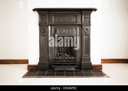 Cast iron fireplace (1930s). Stock Photo