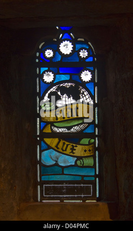 A beautiful, small stained glass window in the upper levels of St Magnus Cathedral, Kikwall, Orkney. Stock Photo