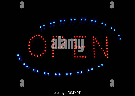 Open Neon Sign in Blue Red and Black Stock Photo