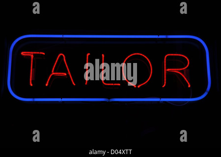 Tailor Electric Blue and Red Neon Sign Stock Photo