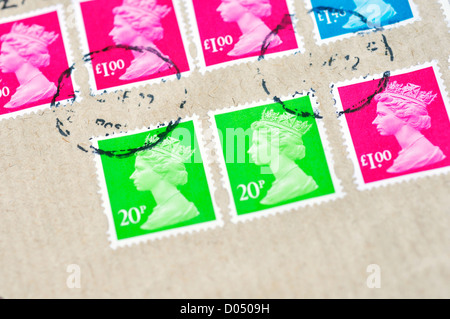 UK postage stamps depicting British Queen Elizabeth II Stock Photo