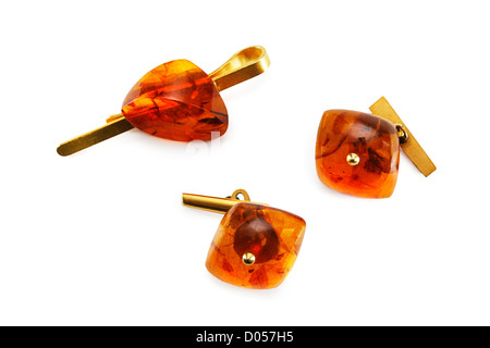 Amber cuff links and clip for necktie isolated on white background. Stock Photo