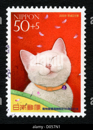 Japan postage stamp depicting smiling cat Stock Photo