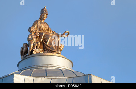 Minerva ancient statue on the roof of Imperial Academy of Arts in St.Petersburg. Was built in 1764-1789 by Jean-Baptiste Vallin Stock Photo