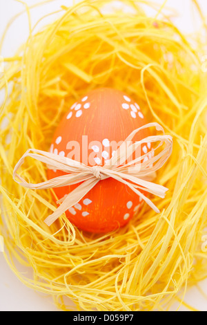Easter egg in nest Stock Photo