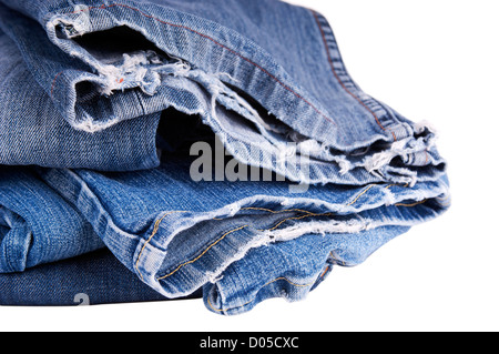 Torn blue jeans hem isolated on white Stock Photo