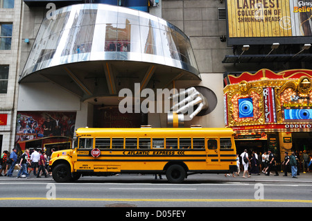 School bus in Broadway at Madame Tussuad's Museum, New York City, USA Stock Photo