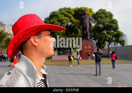 Shanghai China,Chinese Huangpu District,The Bund,Zhongshan Road,Asian man men male adult adults,red felt hat,luxury,statue,memorial,Mao Zedong,Nationa Stock Photo