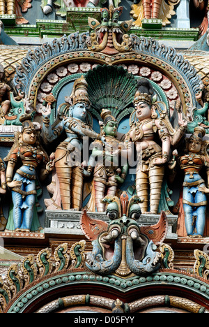 Stucco figures on Meenakshi Amman Temple's (Hindu;Saivite) south tower (gopuram); Madurai; Tamil Nadu; India Stock Photo