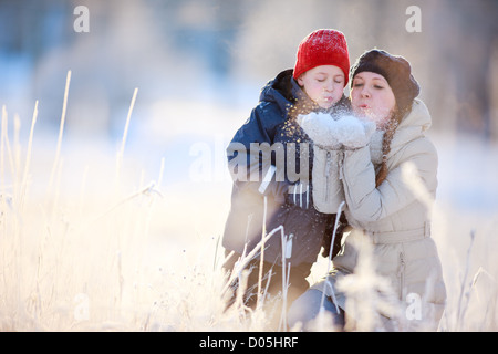 Mother and son outdoors at winter Stock Photo