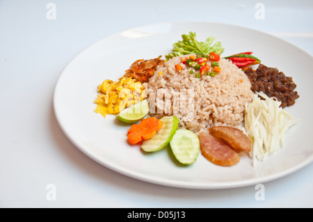 delicious Thai food call KHAO KLOOK KAPI from mixed ingredient chili,mango fried egg shrimp rice Stock Photo