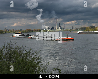 Articulated barges 'Explosief II' loaded with coal sailing on the Rhine upstream passing Duisburg, Germany. Stock Photo