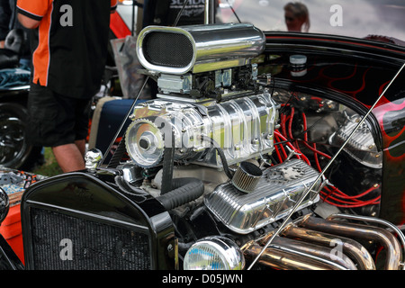 A V8 engine showing performance turbo blower on a hot rod at the Gold Coast Car Show Stock Photo