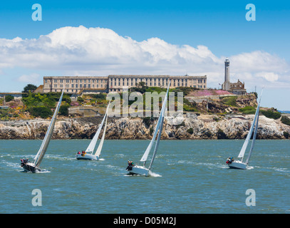 San Francisco - Summer Sailstice yachting (June 23rd 2012). J-105 class racing yachts in the Small Boat Race, with Alcatraz. Stock Photo