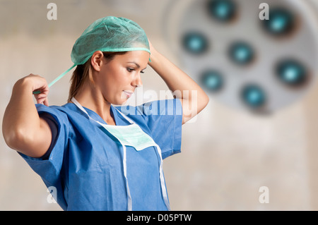 Young female surgeon getting ready for a surgery Stock Photo