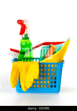 Several kitchen cleaning products in a basket on a white background Stock Photo