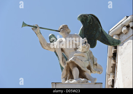 Angel blowing trumpet, Venice, Italy. Stock Photo