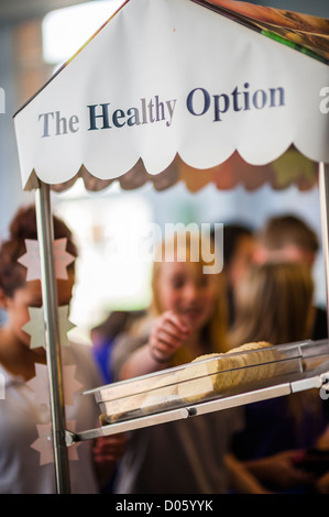 Pupils chosing Healthy option foods on offer Lunchtime in the canteen at a secondary comprehensive school, Wales UK Stock Photo
