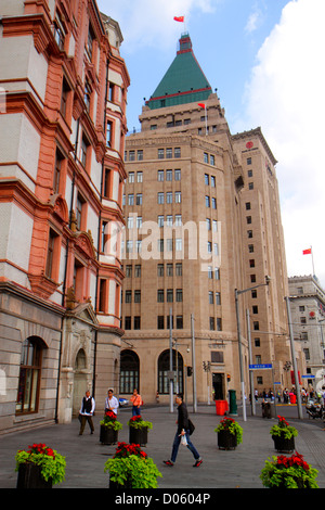 Shanghai China,Chinese Huangpu District,The Bund,East Zhongshan Road,Art Deco Neo Classical style buildings,city skyline,Cathay Peace Hotel 1929,Palac Stock Photo