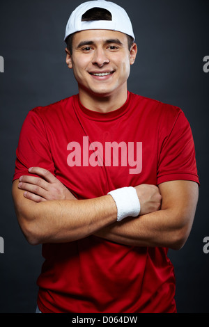 Portrait of cheerful guy in sportswear looking at camera Stock Photo