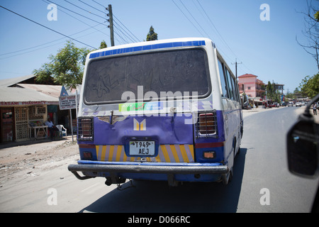 'Al-Shabab' written on a dusty rear window of local dalla-dalla bus, Dar Es Salaam, Tanzania. Stock Photo