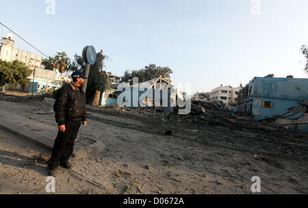 Nov. 19, 2012 - Gaza City, Gaza Strip, Palestinian Territory - A Palestinian policeman surveys the remains of a destroyed police station after Israeli air strike in al-Shijaia in the east of Gaza city on, 19 November 2012. The Palestinian civilian death toll mounted Monday as Israeli aircraft struck densely populated areas in the Gaza Strip in its campaign to quell militant rocket fire menacing nearly half of Israel's population  (Credit Image: © Majdi Fathi/APA Images/ZUMAPRESS.com) Stock Photo