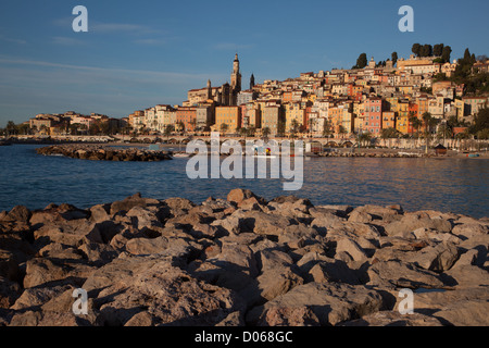 COLOURFUL HOUSES OLD TOWN IN FRONT SABLETTES BEACH SAINT-MICHEL ARCHANGE BASILICA MENTON ALPES-MARITIMES (06) FRANCE Stock Photo