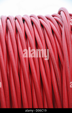 Red detail detailed pipes and electric wires between coils Stock Photo